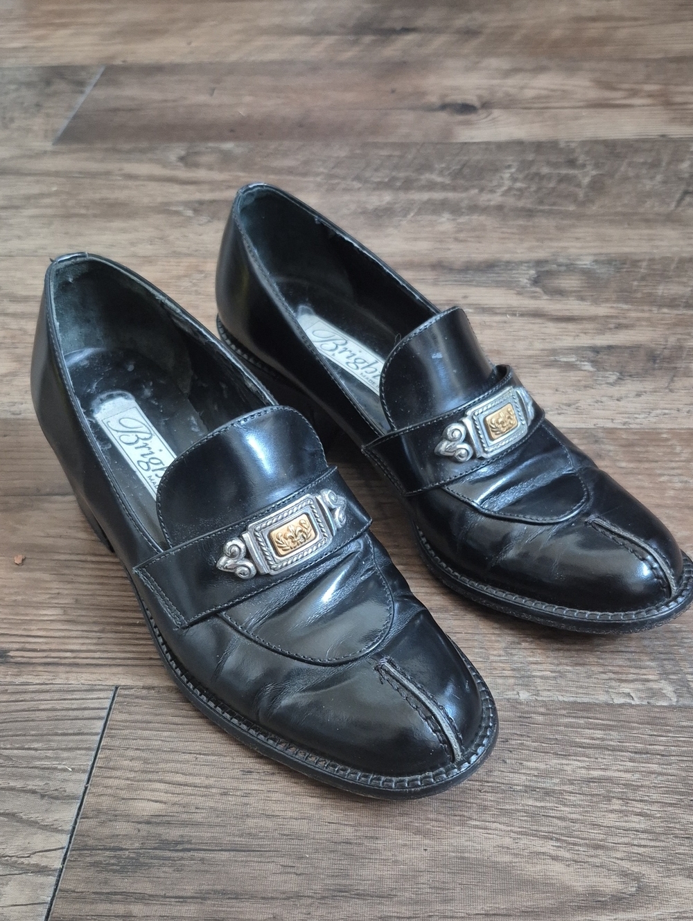 Brighton Black Patent Leather Slip-On Loafers with Gold-Tone Emblem